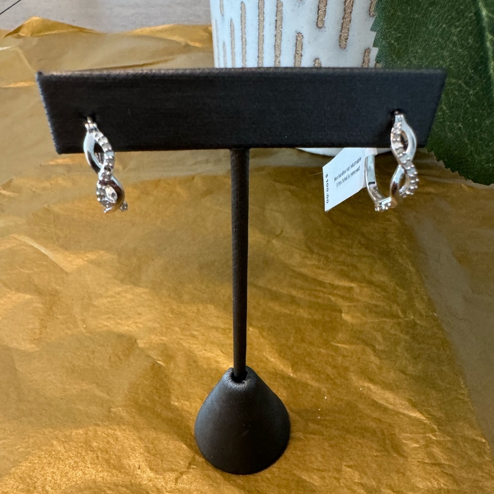 Pretty silver earrings with real diamonds. NWT